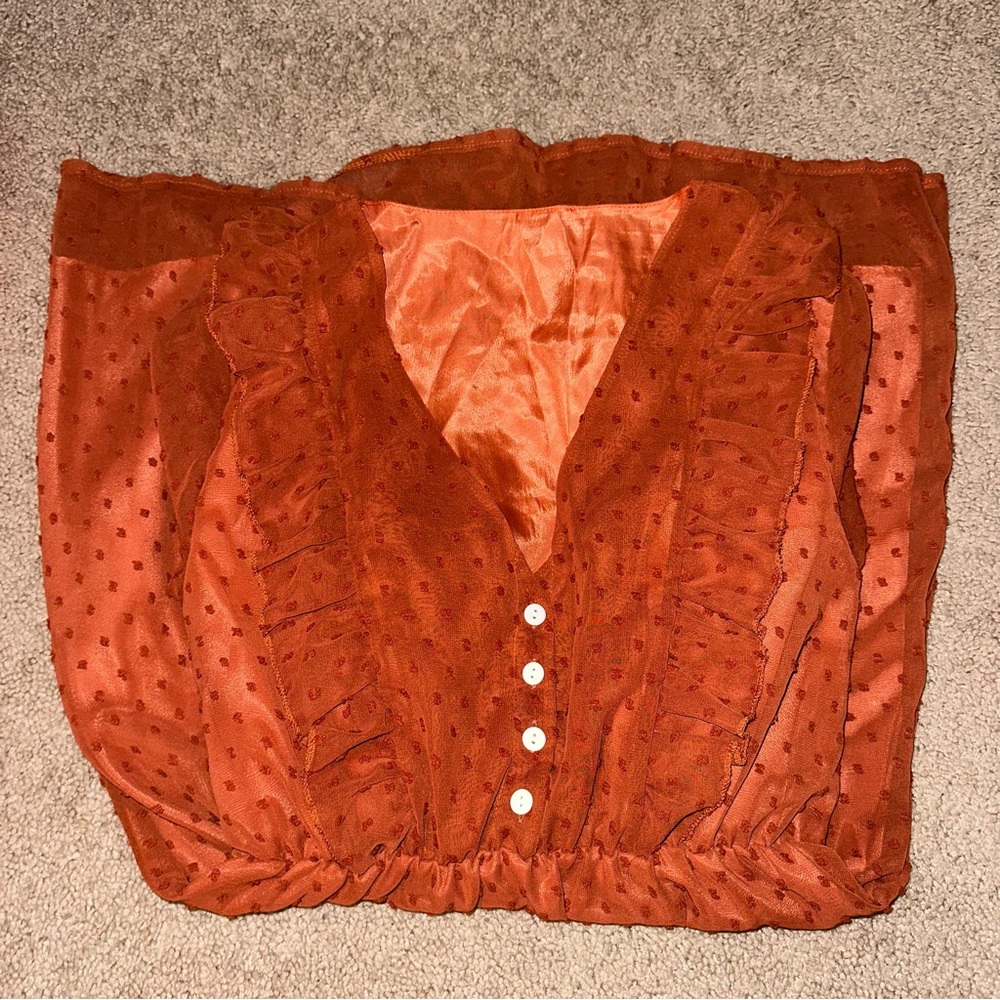 women's burnt orange shear knee length long sleeve dress.